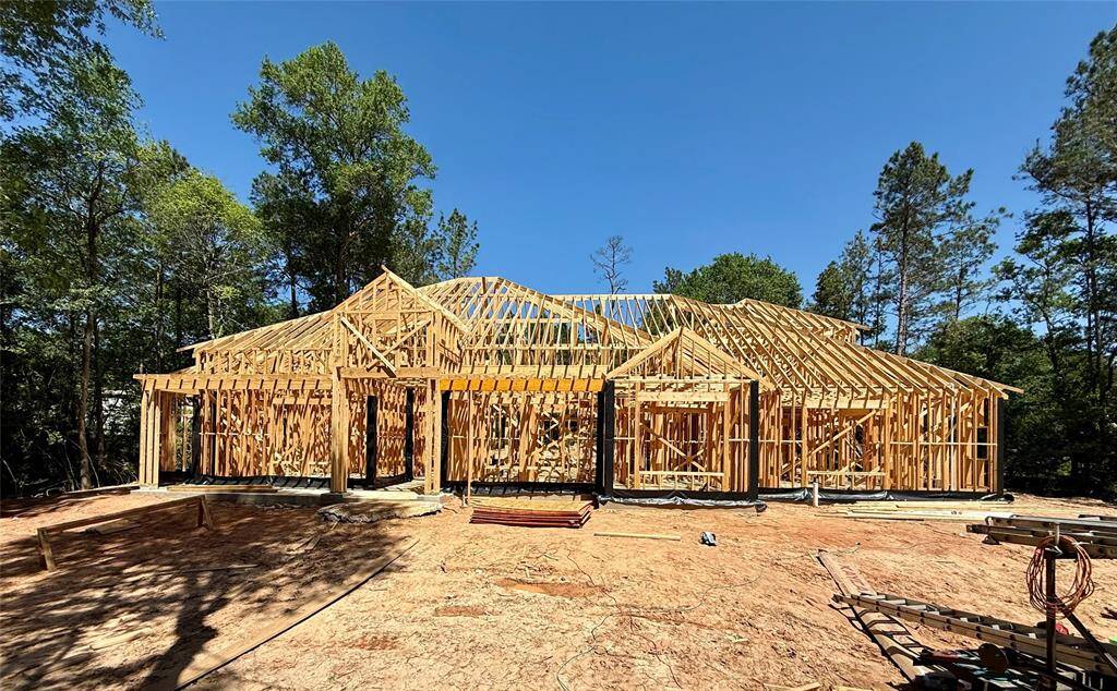 House is framed up so you can see the overall layout. Home has a great open floor-plan, with all the square footage being on the first floor, with the exception of one room and one full bath.