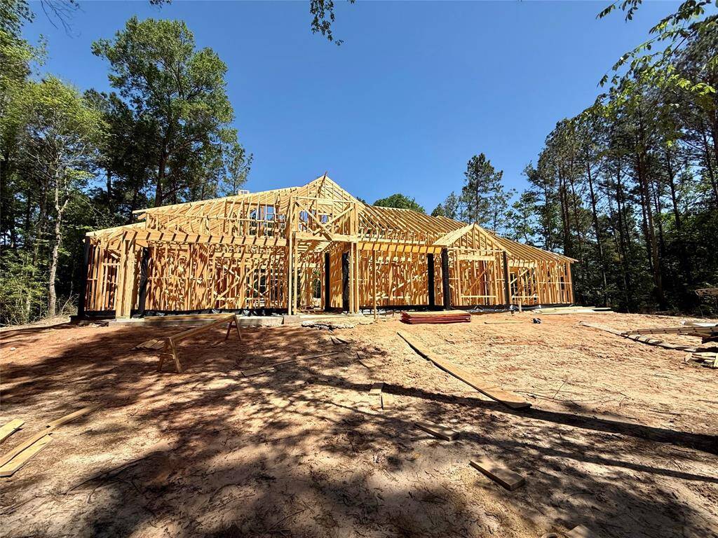 Expanded view of the front of the home showing part of the front yard.