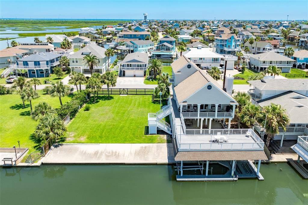 This property is unique and offers an option to build a larger pool, a guest house, a huge entertainment turf, or even a large putting green!