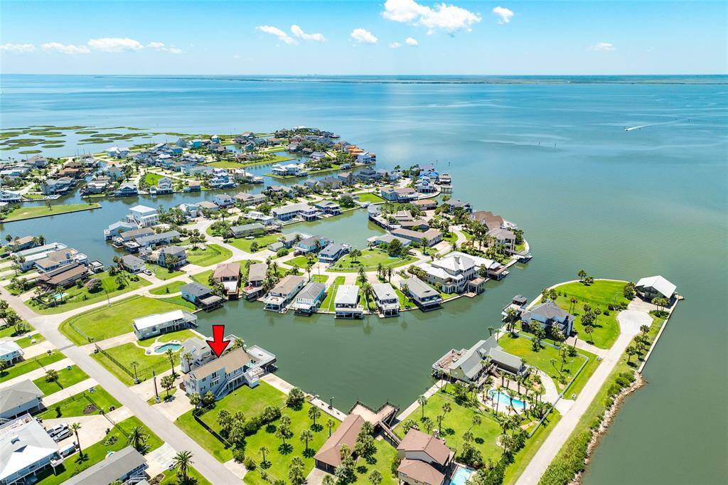 Better than bayfront! This property offers you an the opportunity for a straithgt shot to the bay while still being tucked into a the cove.