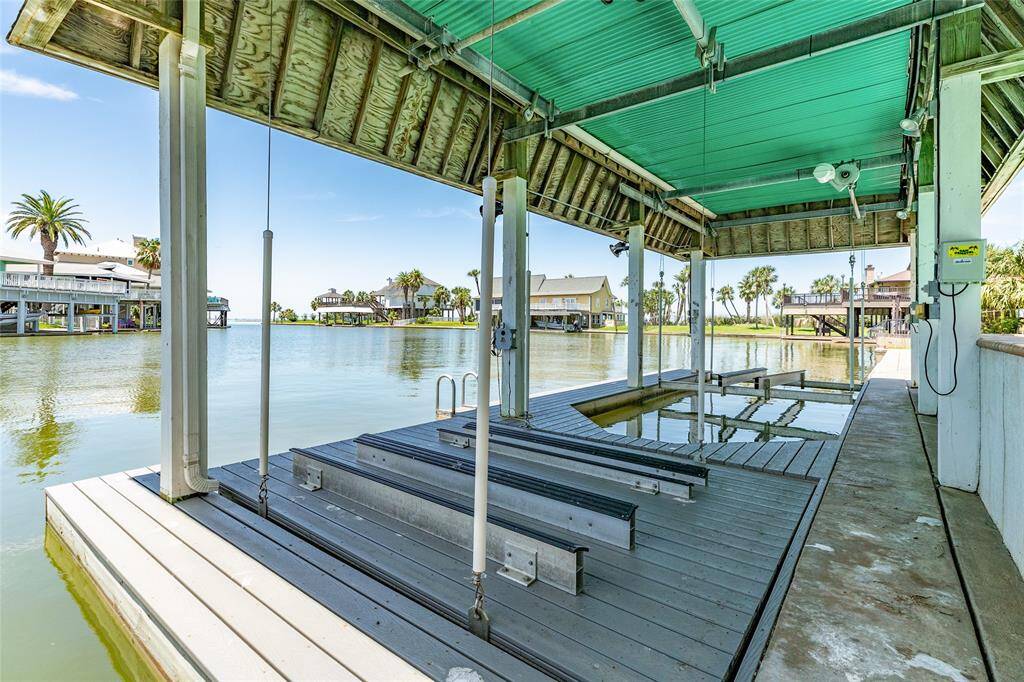 The boat house offers a jet-ski platform lift and a boat lift.