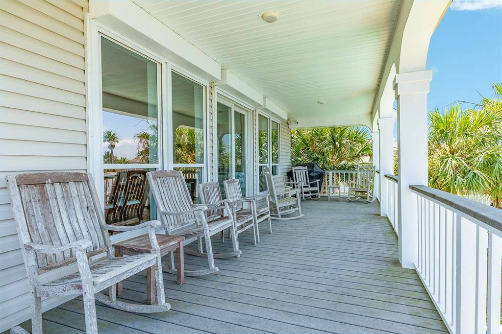 Just beyond the living room, you will love the composite deck material that carries you out over the large boat house to either covered or uncovered outdoor enjoyment.