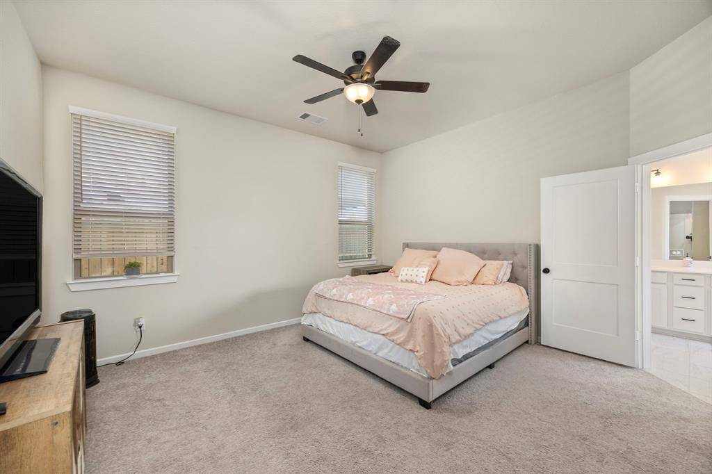 Primary bedroom. A generous space that allows for a variety of furniture arrangements or the addition of a cozy sitting area.