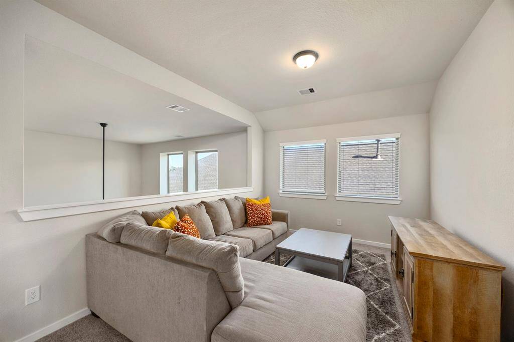 Over look to the living room downstairs.