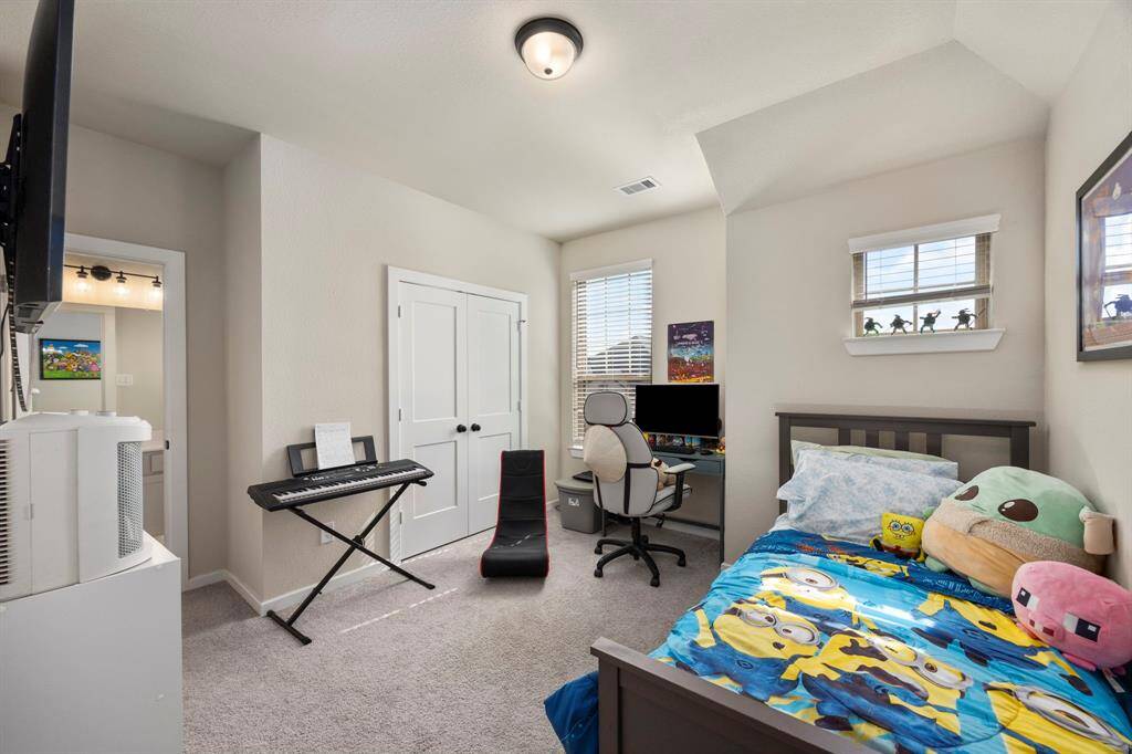 Second guest bedroom upstairs with enough space to have more than just bedroom.