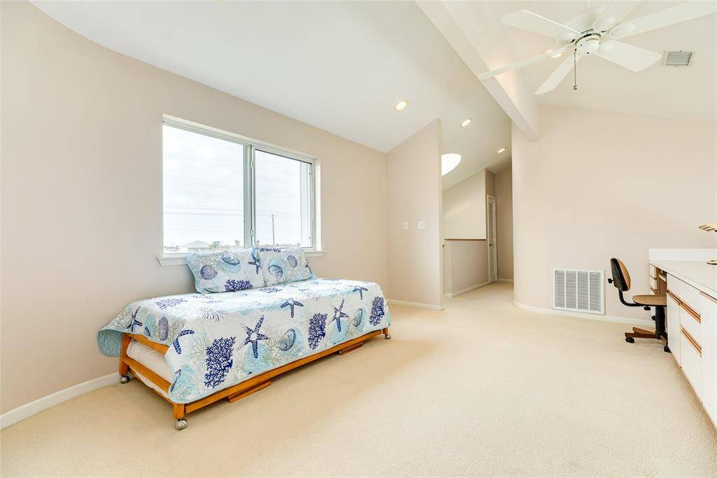 This view of the loft area shows the breadth of the space, note there are bay views from this room as well.