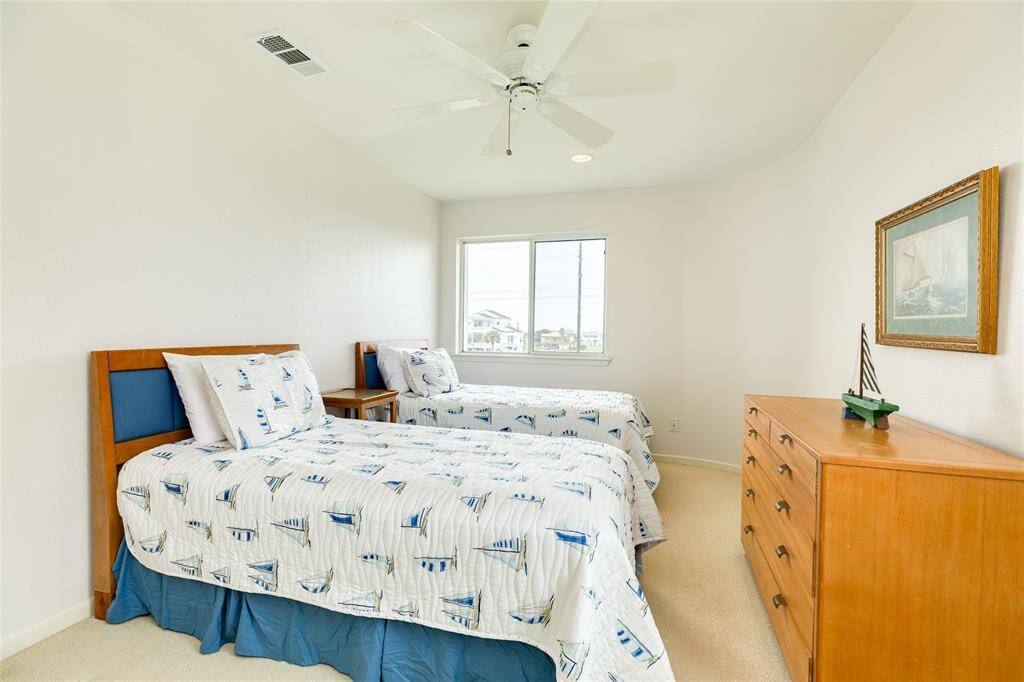 Bedroom 2 is a great size and makes a wonderful bunk room option offering bay views.
