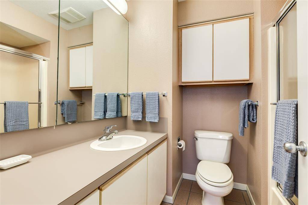 This hall bath upstairs serves the loft and bedroom 2.