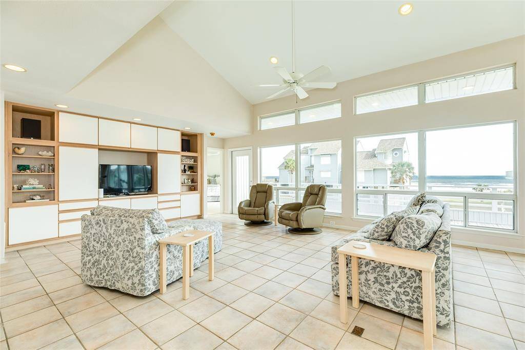 Convenient, built-in storage offers the perfect spot to stash books, games, and family treasures as well display your shell collection! Look at that view!