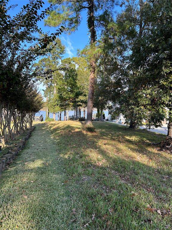 large lot wit trees and gorgeous water view with desirable Northern exposure