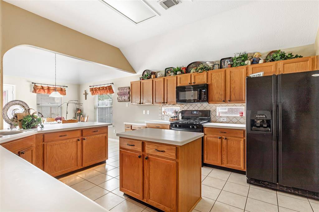 Abundant cabinetry providing lots of storage
