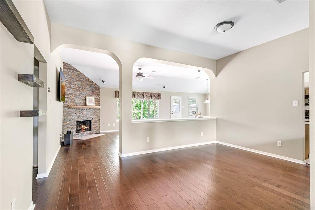 Elegant dining room with a spacious layout, perfect for gatherings and entertaining.