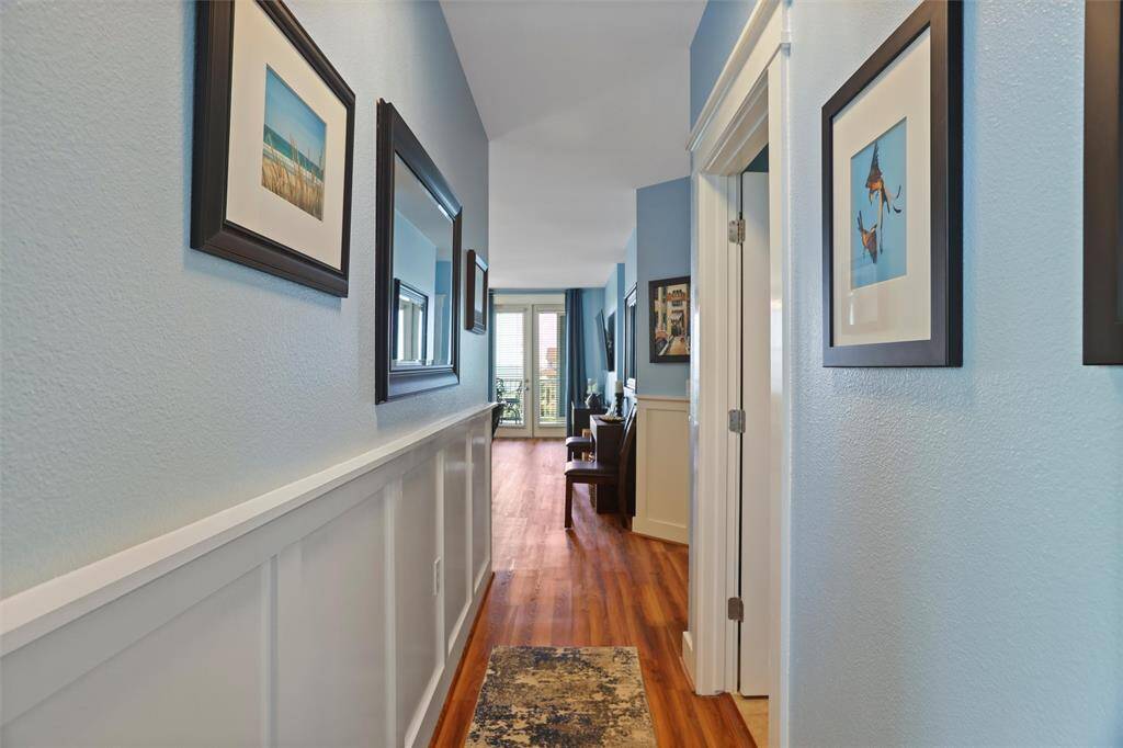 Hallway with full guest bathroom