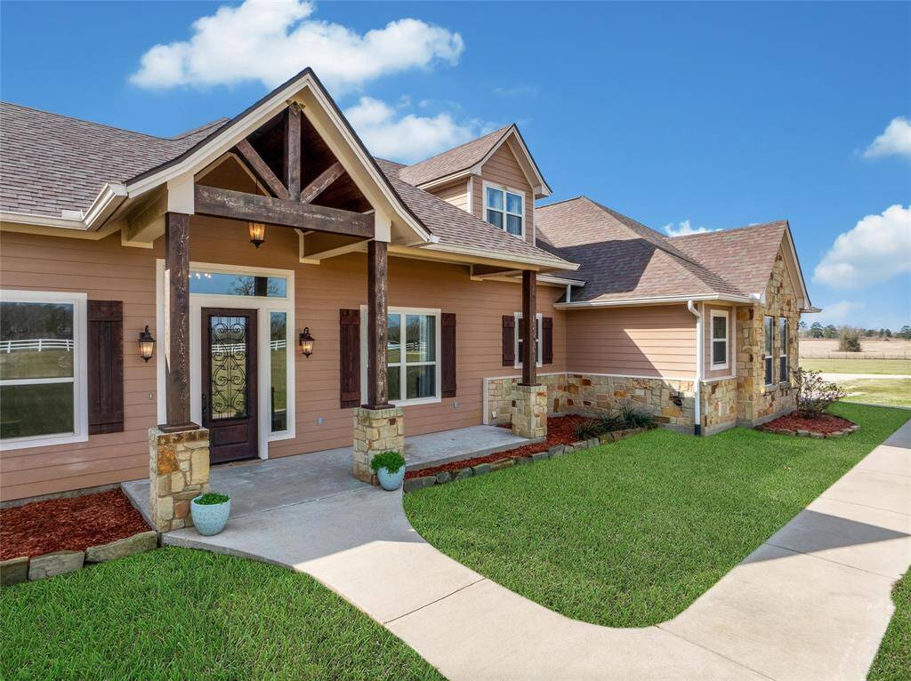 The beams are a gorgeous custom touch to the living area
