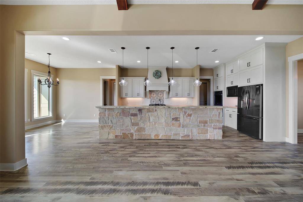 The chefs kitchen is open to the living area and breakfast nook