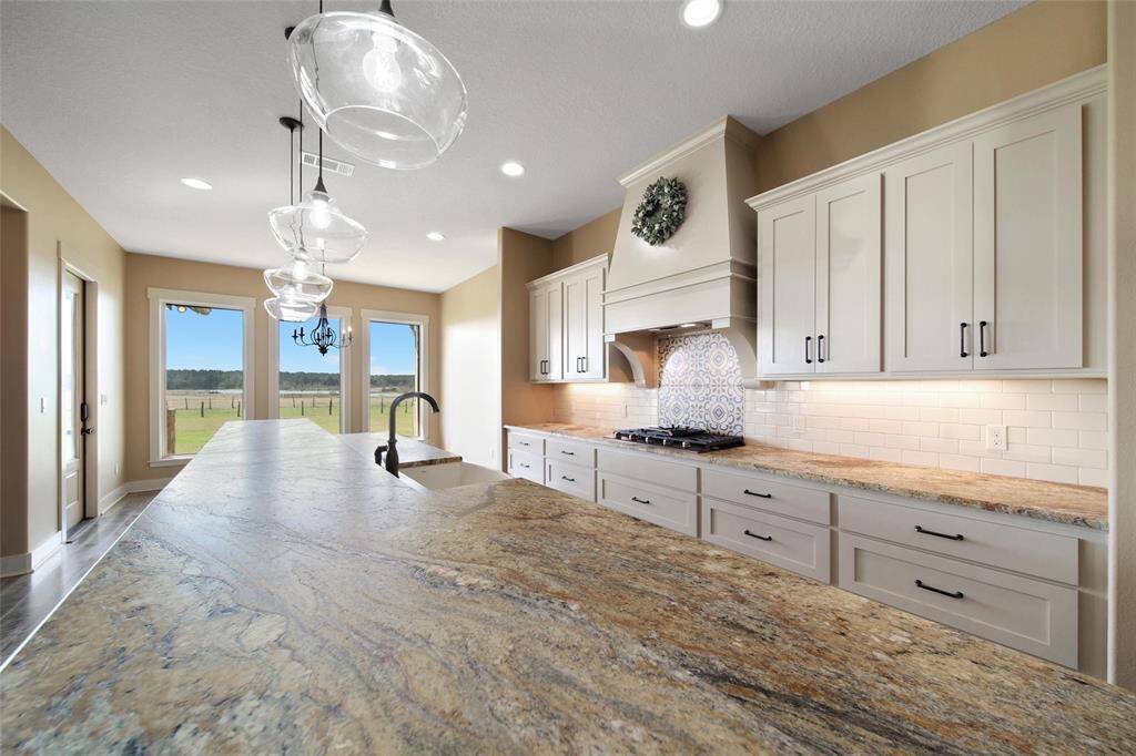 You will find yourself wanting to put hands on the classy leathered granite