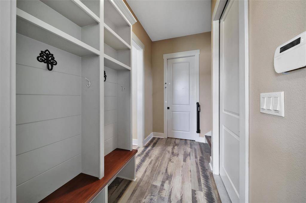 Looking to the pantry with the door closed.
