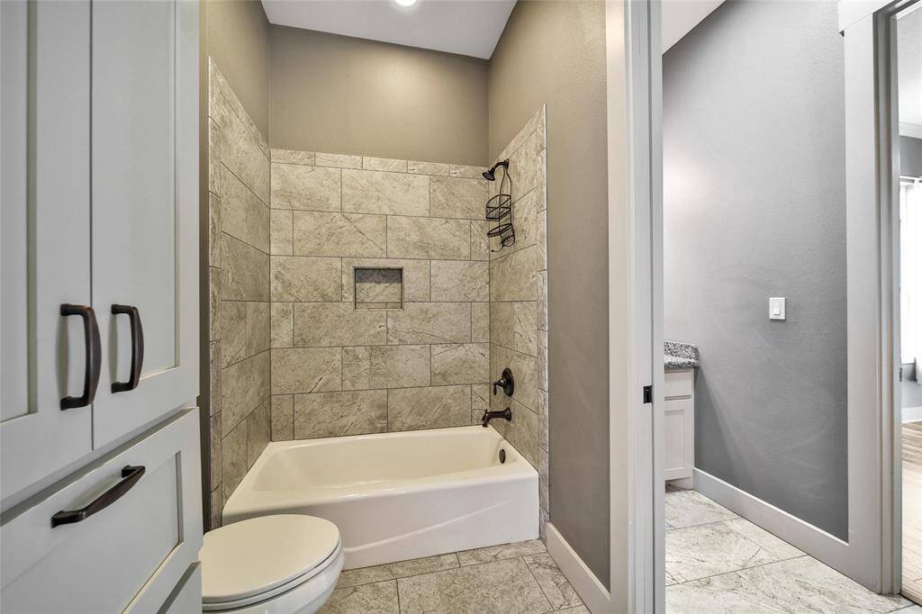 The bathtub and toilet are shared.