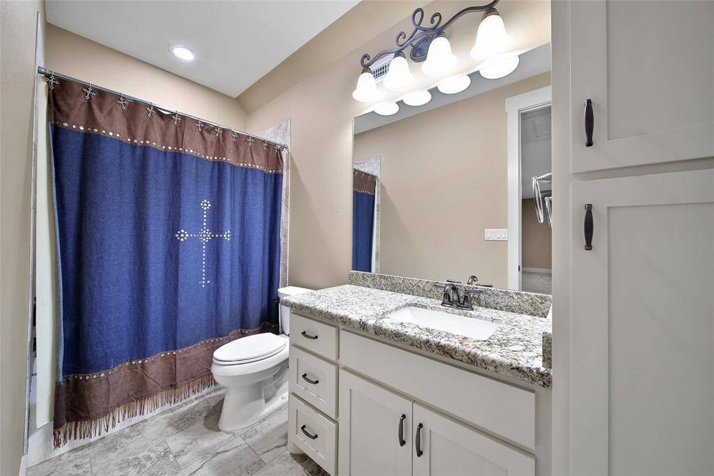The bonus-room bathroom is loaded with storage as well!