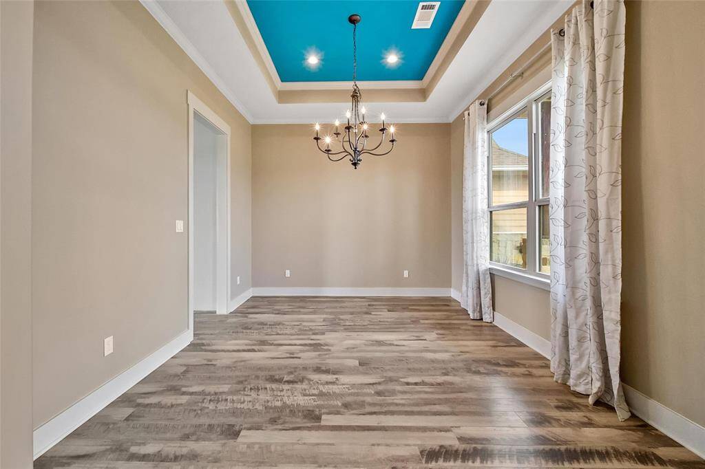 Grand entry looking towards the office, dining room and front door