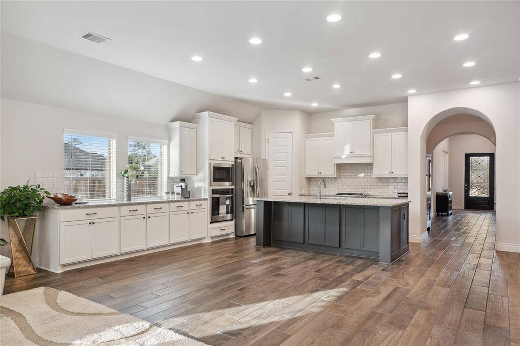 Another photo looking back from the Family room at the Dining and Kitchen areas!