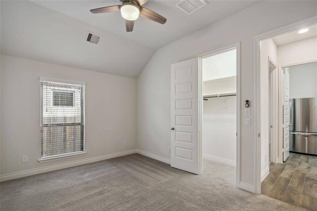 A view of the walk-in closet in Bedroom #2. There is plenty of space in this closet!