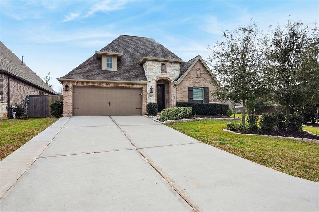 2 car garage with plenty of parking for guests.