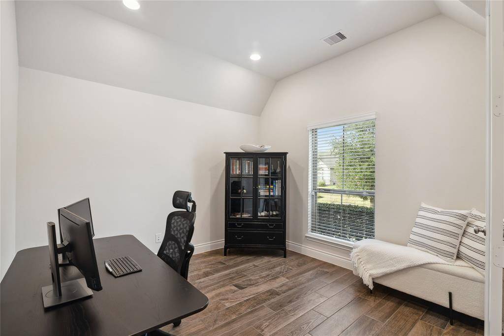 12'x12' Study located at the front of this home with large widow, creates a light and bright room that's so easy to work in!