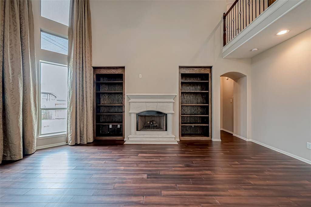 Family room with build in wood bookcases