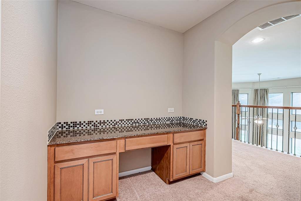 Built in desk outside of bedroom