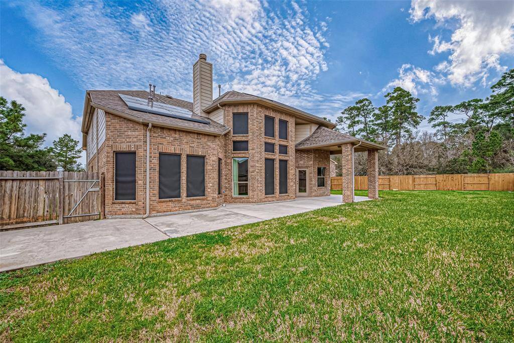 Cement patio and large backyard