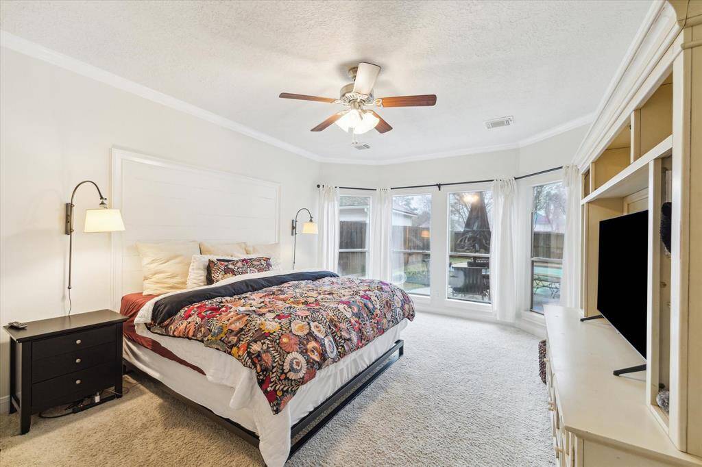 Primary suite with views of pool