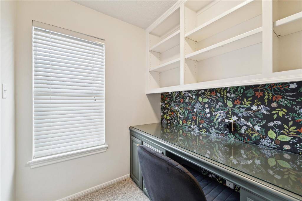 Home office/flex room tucked behind gameroom