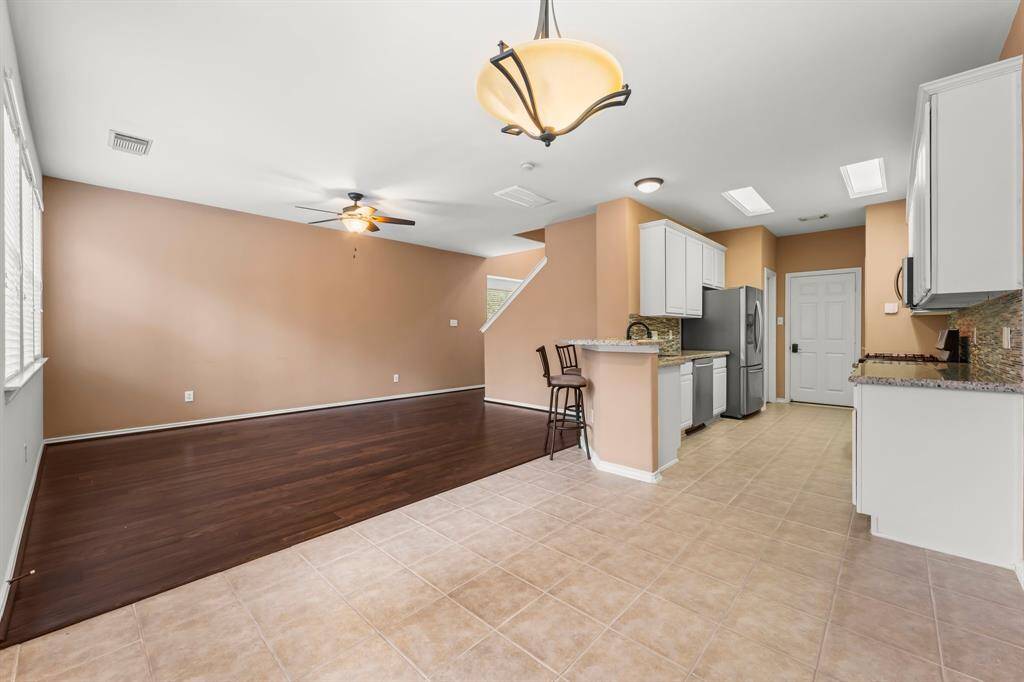 Another view of this open floor plan. Click on the movie reel icon, or visit our on-line documents for a QR code to view our walk-through video.