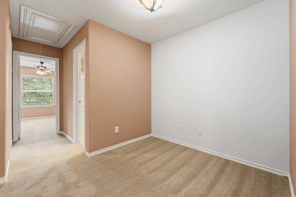 This large loft space upstairs would make a great office or gaming space for kids.