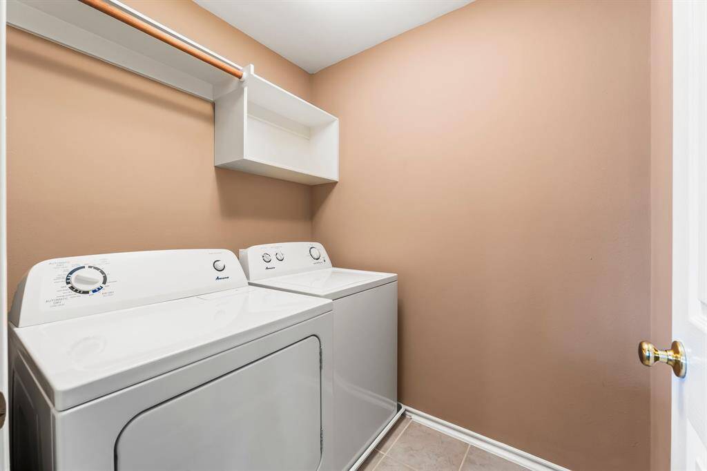 Functional Laundry area is located on the same floor as the bedrooms for convenience! It boasts upper shelving and hanging space. Washer and dryer included!