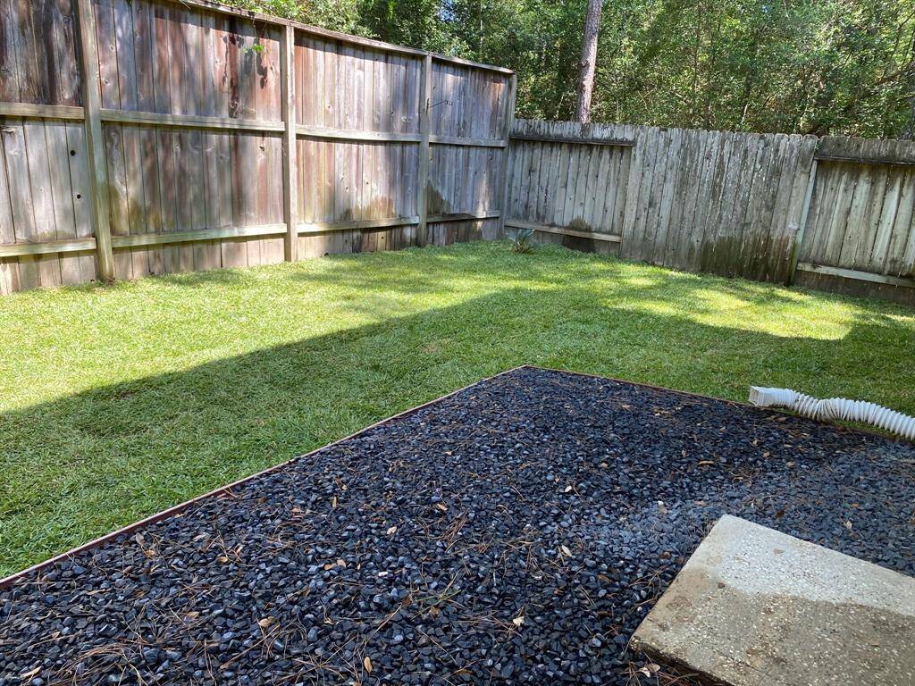 Mature neighboring trees provide privacy, and there is plenty of space for relaxing, playing, or entertaining!