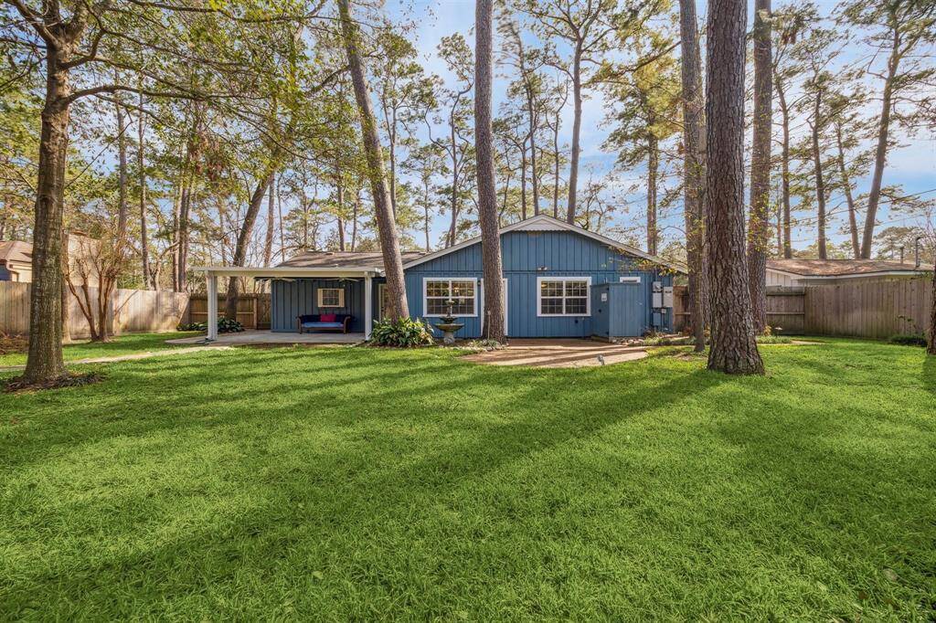 Another view of the fenced backyard.