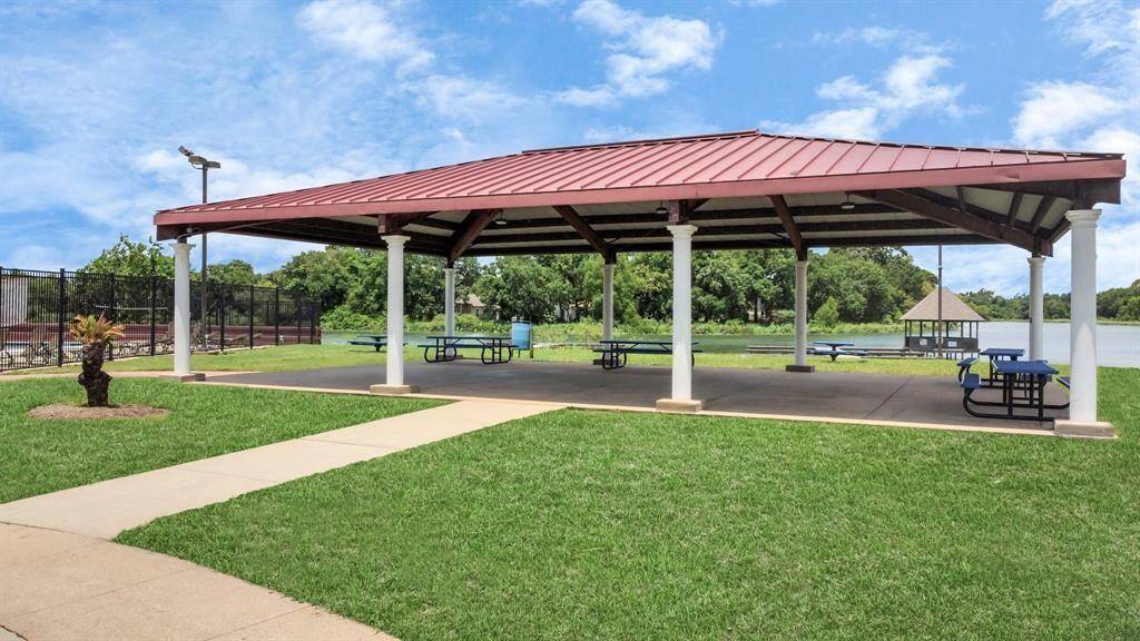 Relax and entertain in this beautiful community pavilion, perfect for gatherings and enjoying the serene surroundings.