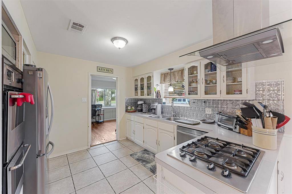 Kitchen with stainless appliances.