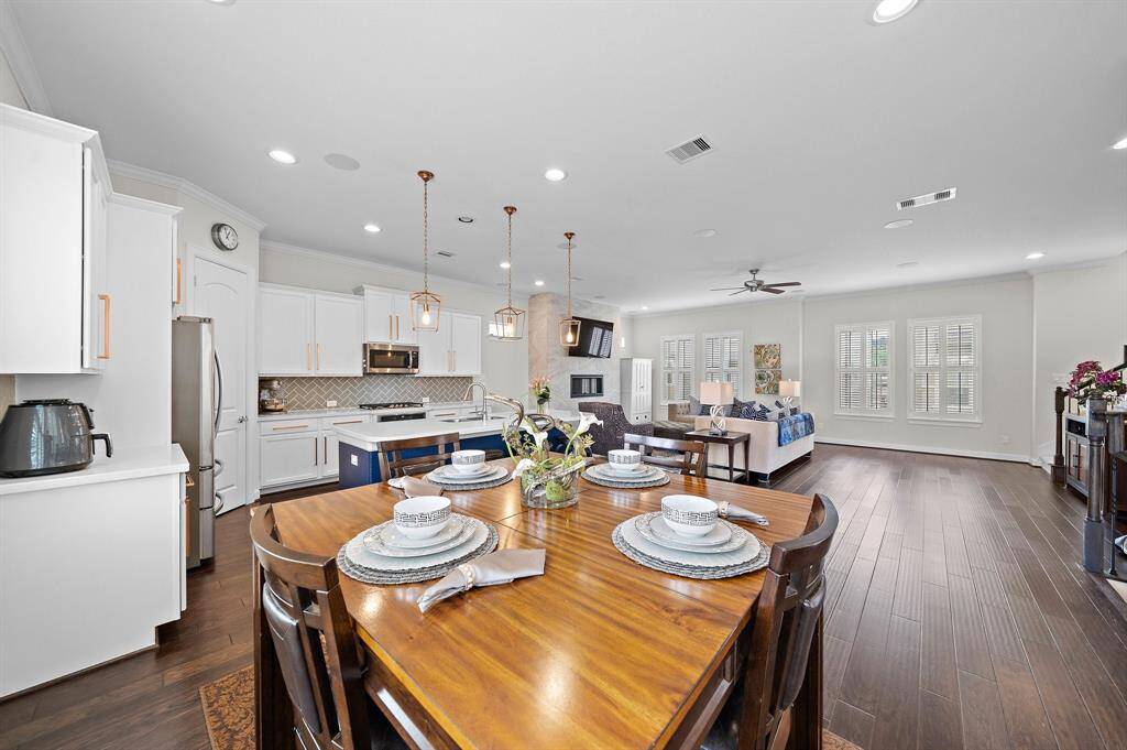 Expansive living area. Farmhouse Windows. Open layout makes this home ideal for gatherings.
