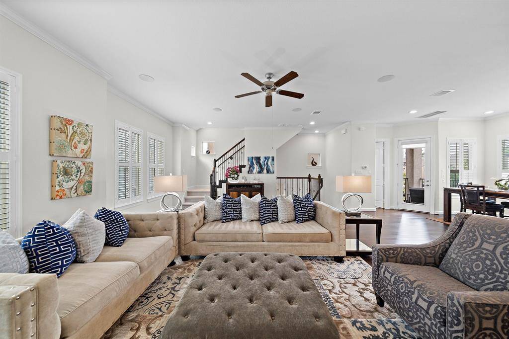 Expansive living area. Gas Fireplace Farmhouse Windows. Open layout makes this home ideal for gatherings.