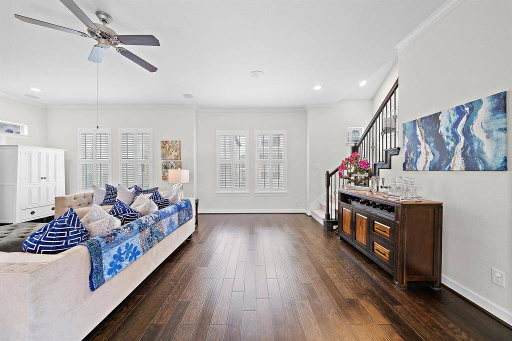 Expansive living area. Gas Fireplace Farmhouse Windows. Open layout makes this home ideal for gatherings.