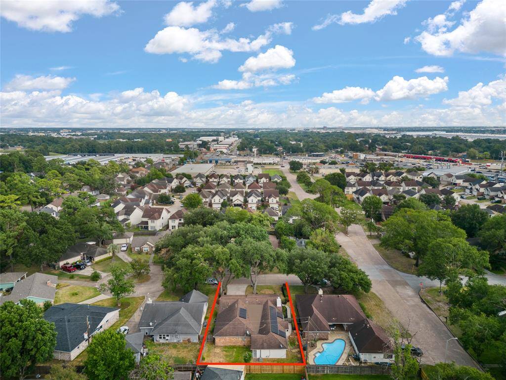 Amazing aerial shot of this gorgeous home situated on a quiet cul-de-sac street in the community of Woodedge Village zoned to Cypress-Fairbanks ISD.
