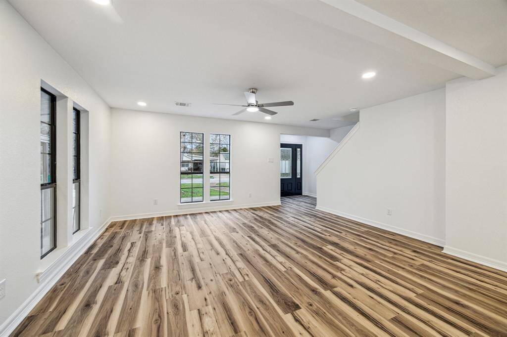 Ample natural lighting feat hickory LVP floors