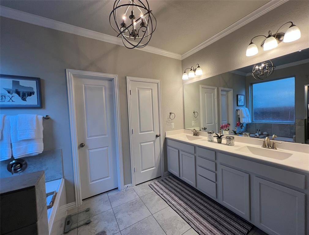 The ensuite primary bath is designed to both relax and inspire. Spoil yourself with this insanely luxurious deep soaking tub and separate shower.