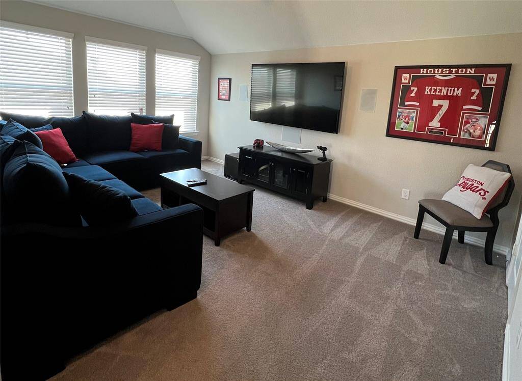 Second level game room featuring installed 5.1 speaker surrond system.