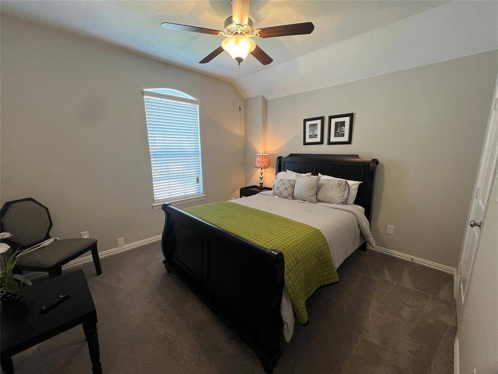Second bedroom features tranquil environment with plenty of natural light.