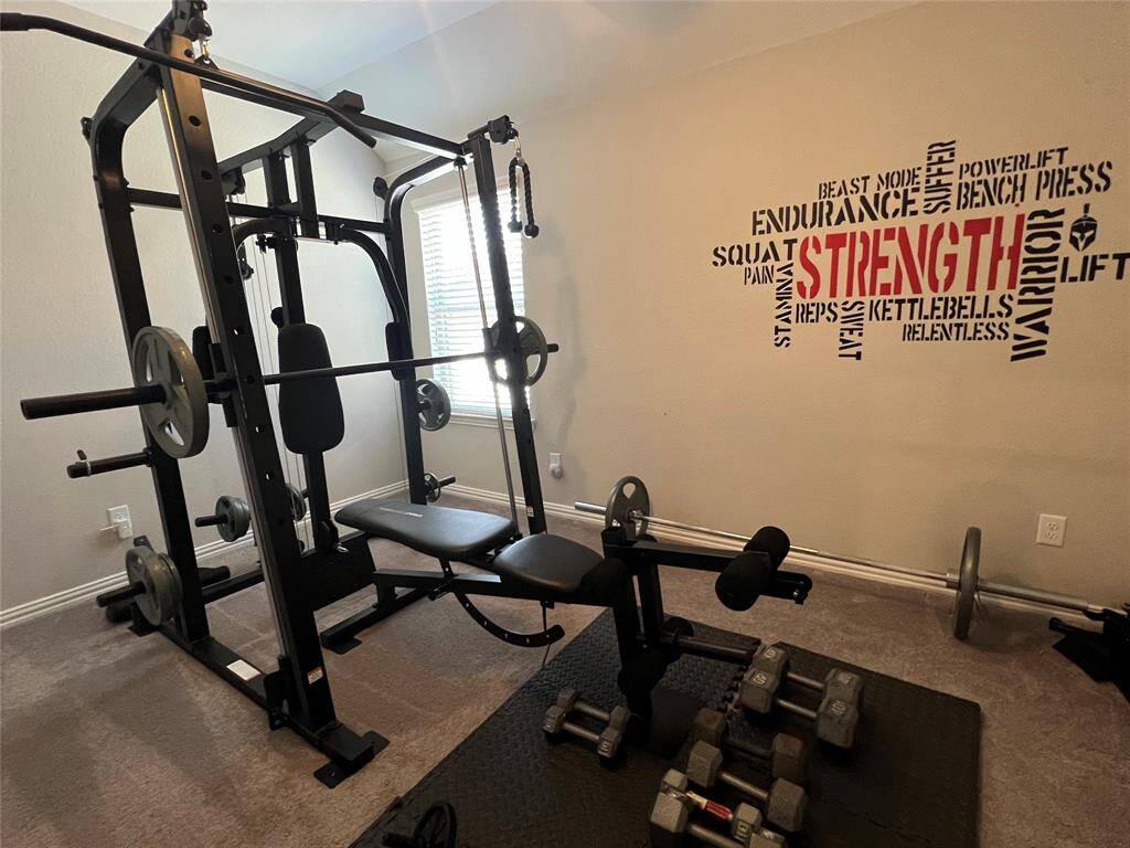 Large fourth bedroom currently used as home gym.