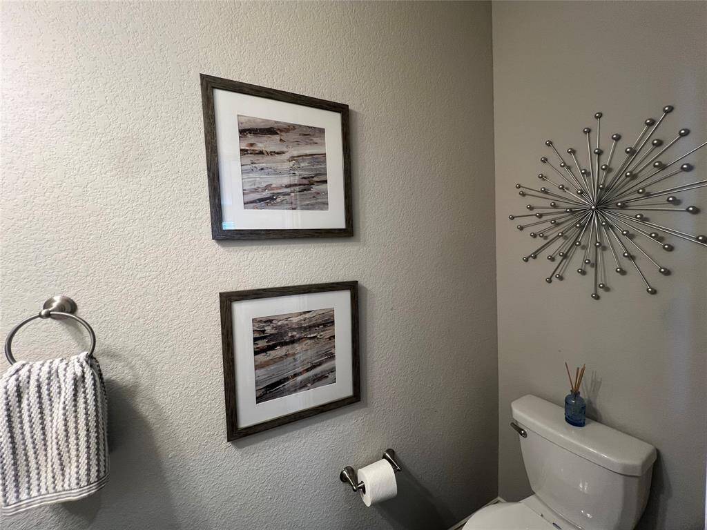 Powder room provides privacy and convenience.